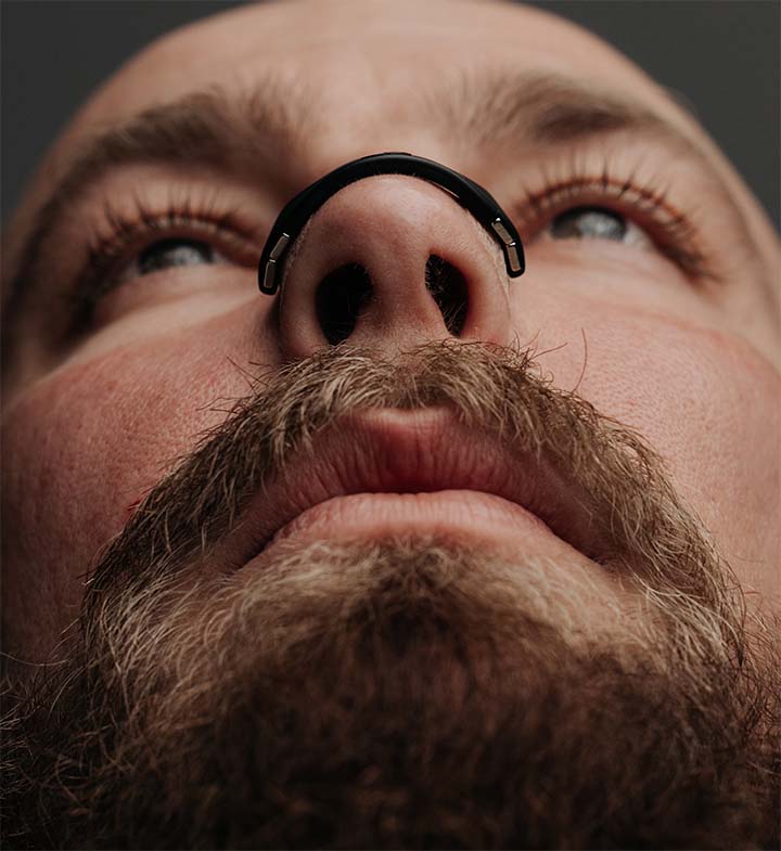Person wearing Intake, nostrils held open from the sides